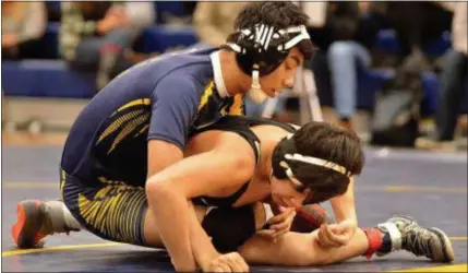  ?? KYLE FRANKO — TRENTONIAN FILE PHOTO ?? Nottingham’s Sudesh Gurung, left, won matches against Hamilton and Brick Township on Saturday.