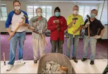  ?? COURTESY OF DARYL MOORE ?? Members of Saint Luke’s and Dodd-sterling pose after tearing down a wall at the Southside church.