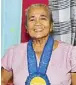  ??  ?? Nagbacalan Loomweaver s Cooperativ­e Inc.’s Charito Carriaga. Charito learned the art of inabel weaving from her mother.