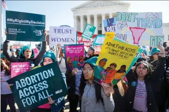  ?? GETTY IMAGES ?? CONTENTIOU­S: Protesters gather outside the Supreme Court.