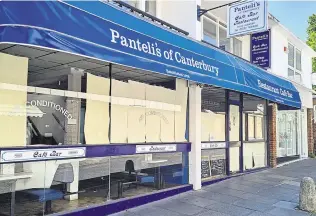  ?? ?? The windows of Panteli’s in Canterbury Lane are papered over