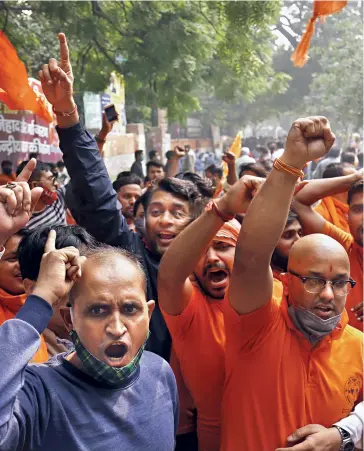  ??  ?? SAFFRON IRE A Vishwa Hindu Mahasangh protest against ‘love jihad’ and religious conversion­s in New Delhi, Nov. 8