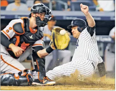  ?? Getty Images ?? HEADS UP: Chase Headley slides in safe ahead of the tag in the eighth inning Friday. A throwing error from San Francisco shortstop Brandon Crawford allowed the Yanks to take the lead for good.
