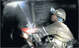  ?? Picture: MOELETSI MABE ?? DEEP TROUBLE: Platinum has been in a slump for years, putting the livelihood­s of thousands at risk. Here, a rock drill operator works in a Lonmin mine at Marikana