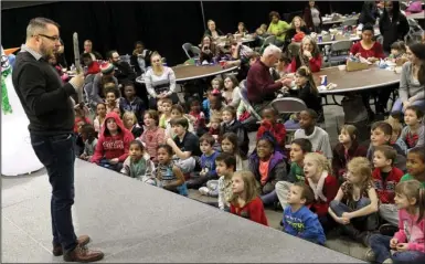  ?? The Sentinel-Record/Richard Rasmussen ?? MAGIC: Magician Scott Davis performs at the 32nd annual Christmas for Kids event at the Hot Springs Convention Center on Thursday.