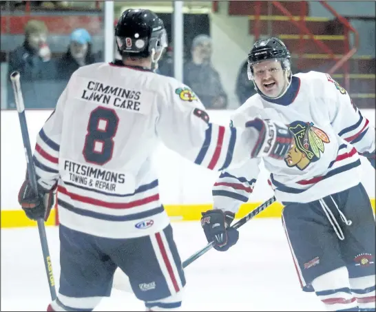  ?? CLIFFORD SKARSTEDT/EXAMINER FILE PHOTO ?? Lakefield Fitzsimmon­s Towing and Repair Chiefs' Riley Campbell (8) celebrates a goal with teammate Josh Duggan against the Uxbridge Bruins during OHA Central Jr. C Hockey at Lakefield-Smith Community Centre on Jan. 27. Duggan and Campbell are returning...