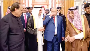  ??  ?? King Salman receives Pakistani President Mamnoon Hussain, left, Yemeni President Abed Rabbo Mansour Hadi, second right, and Chairman of the National Assembly of Kuwait Marzouq Ali Mohammed Al-Ghanim, second left, at Al-Safa Palace in Makkah on...