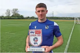  ?? ?? Elliot Anderson with his April player of the month award