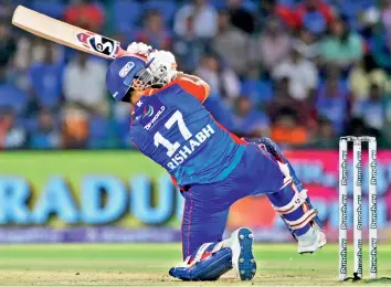  ?? AP ?? Delhi Capitals captain Rishabh Pant goes down on his knee to play an off-balance shot during his unbeaten 88 against Gujarat Titans in New Delhi on Wednesday.
—