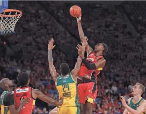  ?? PAUL KANE/GETTY IMAGES ?? Alex Sarr of France puts a shot up during an NBL semifinal series between Perth and Tasmania in Australia on March 13.