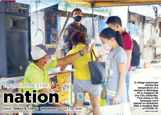  ?? GERRY LEE GORIT ?? A village watchman checks the temperatur­e of a woman in Barangay 35 in Cagayan de Oro City yesterday. Five zones in the barangay were placed on lockdown after a resident died of COVID-19.