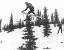  ?? Provided by Aspen Historical Society ?? A skier jumps a tree in the Big Burn area at Snowmass in 1967, the year the resort opened.