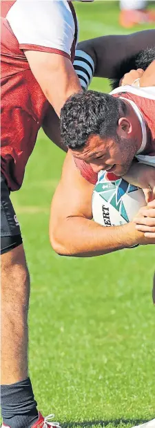  ??  ?? PREPARATIO­NS: England’s Ellis Genge breaks through during a training session at the Fuchu Assahi Football Park as the team limbers up to face the Springboks