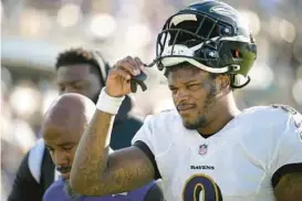  ?? PHELAN M. EBENHACK/AP ?? Ravens quarterbac­k Lamar Jackson leaves the field after the end of the first half of a game against the Jaguars on Nov. 27 in Jacksonvil­le, Florida.