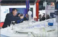  ?? ZOU HONG / CHINA DAILY ?? A robot solution provided by Baidu is demonstrat­ed at the fourth World Internet A foreign delegate