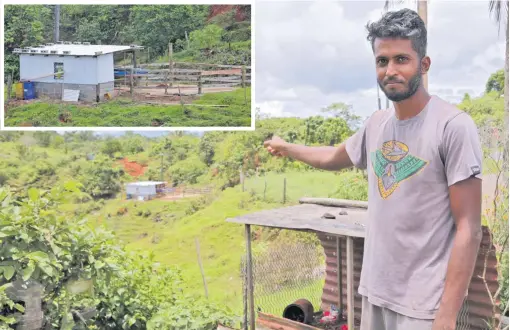  ?? AZARIA FAREEN ?? Niklesh Ravin points at the new shed constructe­d with government assistance.Photo: