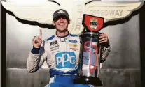  ?? Sean Gardner / Getty Images ?? Austin Cindric after winning the NASCAR Xfinity Series race at the Brickyard at Indianapol­is Motor Speedway.