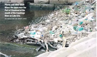  ?? ALLIANCE FOR THE GREAT LAKES ?? Plastic and other trash litters the shore near the Port of Cleveland at the mouth of the Cuyahoga River on Lake Erie.