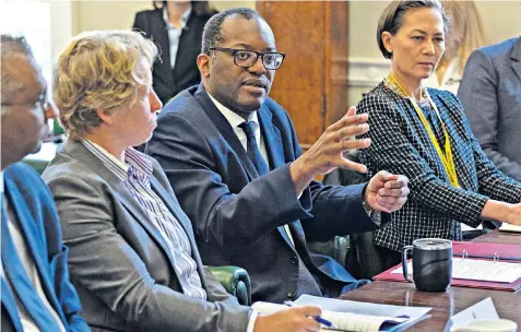  ?? ?? Kwasi Kwarteng, the Chancellor, meets representa­tives from the investment banking sector at the Treasury after his mini-budget spooked the markets