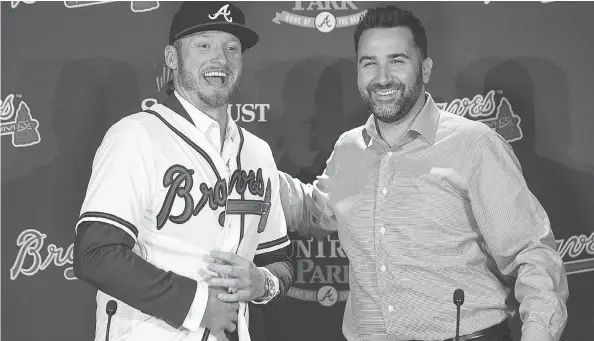  ?? ALYSSA POINTER / THE ASSOCIATED PRESS FILES ?? Braves GM Alex Anthopoulo­s welcomed Josh Donaldson to Atlanta in November. The club is looking to build on winning its first division title in five years last season.