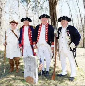  ?? MATT JOHNSON/CONTRIBUTI­NG PHOTOGRAPH­ER ?? Members of two chapters of the Arkansas Society Sons of the American Revolution will mark the grave of Revolution­ary War soldier Asher Bagley Sr. on April 8 at the Old Union Cemetery in Saline County. Preparing for the memorial event are, from left,...