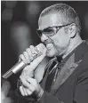  ?? ASSOCIATED PRESS FILE PHOTO ?? George Michael sings in a 2012 concert.