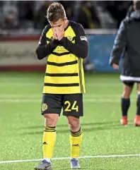  ??  ?? Left: Midfielder Robbie Mertz after the Riverhound­s’ quarterfin­al playoff loss to Louisville City FC.