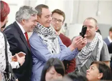  ?? — Reuters ?? Britain’s former prime minister Gordon Brown poses for a photograph following a Labour Party campaign speech at the engineerin­g department of Coventry University.