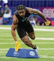  ?? Justin Casterline / Getty Images ?? LSU linebacker Damone Clark was assessed as a third-rounder, but Dallas got him in the fifth.