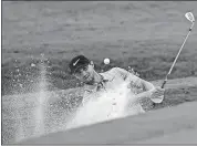  ?? [DAVID GOLDMAN/THE ASSOCIATED PRESS] ?? Kyle Stanley hits out of the bunker on the 18th hole during the first round of the Tour Championsh­ip on Thursday at East Lake Golf Club in Atlanta.