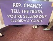  ?? DOUGLAS SOULE/USA TODAY NETWORK - FLORIDA ?? On Jan. 16, Gen Z protesters piled into the office of Republican Rep. Linda Chaney of St. Pete Beach, the sponsor of a bill that peels back child labor laws in Florida. They wanted to speak to Chaney, but ended up sharing their concerns with an aide.