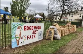  ?? SUBMITTED PHOTO ?? Saturday’s Edgewood Cemetery Art Fair and Cleanup netted about $2,400to kick off the spring maintenanc­e season, not to mention the many bags of yard waste for composting.