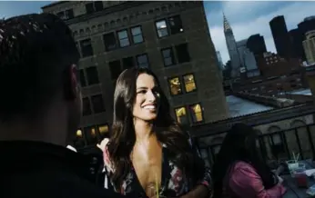  ?? DINA LITOVSKY/THE NEW YORK TIMES ?? Surkus allows companies to pay users, such as Miss New York USA runner-up Briana Siaca, to attend events.