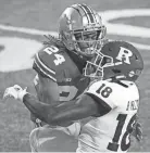  ?? DISPATCH FILE PHOTO ?? OSU CB cornerback Shaun Wade (24), shown covering Rutgers WR Bo Melton in a Nov. 7 game, is expected to enter the NFL draft.