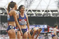  ?? IAN KINGTON/AFP/GETTY IMAGES ?? Among the few Canadian women with an outside shot at the podium in track and field is 1,500m runner Gabriela DeBues-Stafford, second from left, who is ranked 11th in the world.