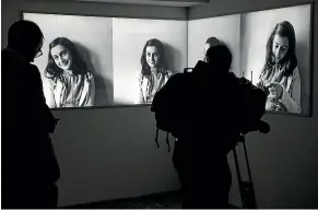  ?? AP ?? Journalist­s take images of the renovated Anne Frank House Museum in Amsterdam.