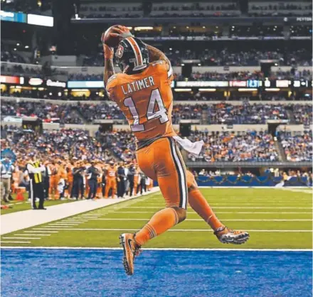  ?? John Leyba, The Denver Post ?? Broncos wide receiver Cody Latimer shows his hops in hauling in a two-point conversion during last week’s 25-13 victory over the Colts. In the game, Latimer also had three catches for 60 yards, including a leaping, 22-yard TD grab.