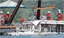  ?? NATHAN PAPES THE ASSOCIATED PRESS ?? The boat went down Thursday evening after high winds hit.