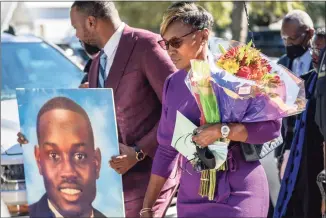  ?? Sean Rayford / Getty Images ?? Wanda Cooper-Jones, mother of Ahmaud Arbery, leaves the Glynn County Courthouse as jury deliberati­ons begin in the trial of the killers of her son on Tuesday in Brunswick, Ga.