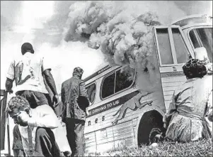  ?? Underwood Archives ?? AFTER the Freedom Riders’ bus was firebombed in May 1961 just outside Anniston, Ala., the author — then 12 years old — stepped out of the crowd to tend the injured.