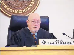  ??  ?? State District Judge Charles Brown said Justin Hansen will be released if he can find a “responsibl­e citizen” to stay with, who will “make sure he lives there, stays there, he’ll never be unaccompan­ied anywhere.”