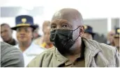  ?? Picture: MARK ANDREWS ?? BURNING QUESTION: Isaac Plaatjies joins his nine co-accused in the Dikeni magistrate’s court yesterday in Alice.