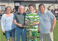  ??  ?? The Celtic Golden Jubilee Cup was won by Celtic Boys U/13, who beat Mearns 6-3 in the final. Presentati­on (from left) shows Jen Malone and Ged Donnelly (Celtic BC officials), Jacob Shaw (Celtic U/13 captain) and Graeme Webster (Celtic BC president).