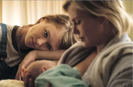  ?? FOCUS FEATURES ?? Mackenzie Davis, left, and Charlize Theron star in Tully, a movie that takes a provocativ­e look at modern motherhood.