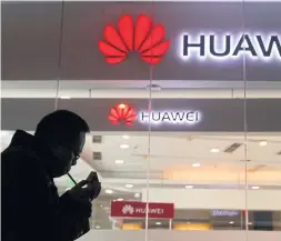  ?? NG HAN GUAN THE ASSOCIATED PRESS FILE PHOTO ?? Do you know what China’s Huawei Technologi­es Co. Ltd. is doing to convince Ottawa not to ban its equipment from 5G telecommun­ications networks?