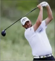  ?? CHRIS CARLSON - THE ASSOCIATED PRESS ?? Marc Leishman, of Australia, hits on the second tee during the fourth round of the U.S. Open golf tournament Sunday, June 18, 2017, at Erin Hills in Erin, Wis.