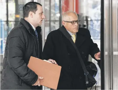  ?? PAT NABONG/SUN-TIMES ?? Former ComEd executive Fidel Marquez (right) with his lawyer Friday at the Dirksen Federal Courthouse.