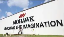  ?? STAFF FILE PHOTO ?? Mohawk Industries, the world’s biggest floorcover­ing company, is headquarte­red in Calhoun, Ga.