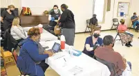  ?? PAUL W. GILLESPIE/CAPITAL GAZETTE ?? A county vaccinatio­n clinic at the Metropolit­an United Methodist Church in Severn on March 23.