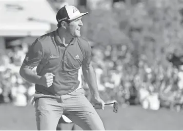  ?? ORLANDO JORGE RAMIREZ, USA TODAY SPORTS ?? Jon Rahm celebrates after making a putt for eagle on the 18th hole to cap his victory Sunday in the Farmers Insurance Open at Torrey Pines.